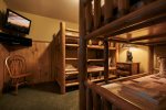 Downstairs bedroom with flat screen tv
